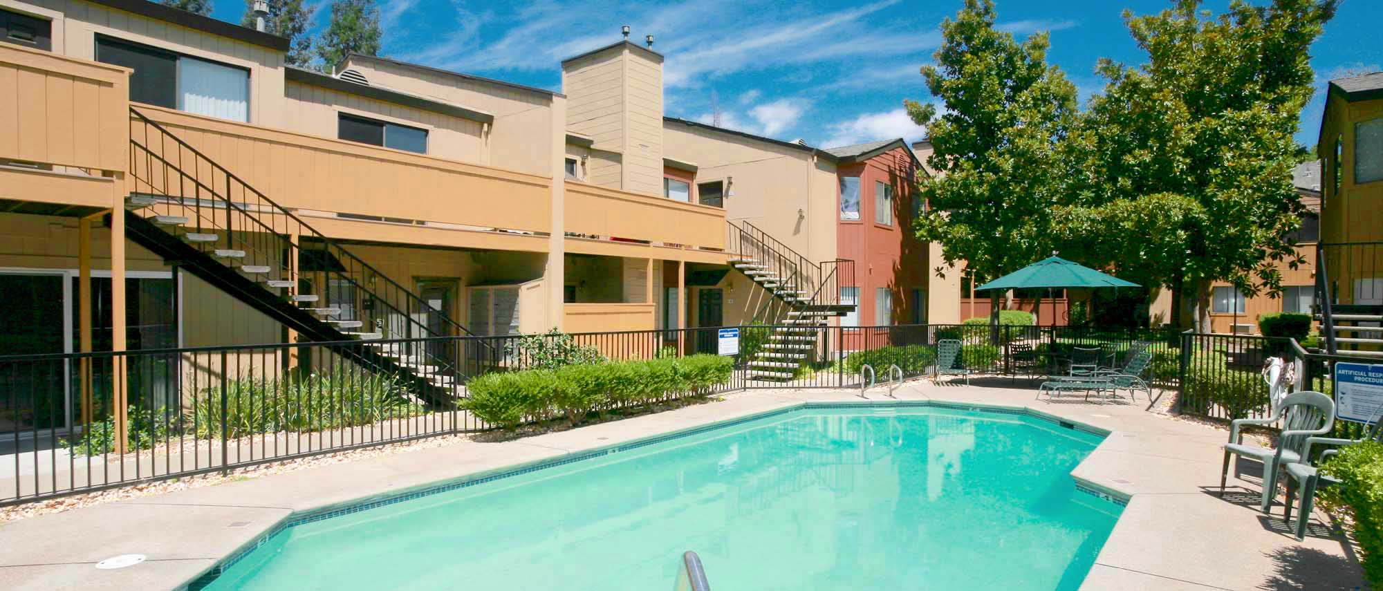 This image shows the swimming pool of the Willow Run Apartments